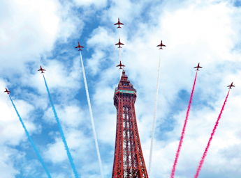 A picture of the Red Arrows flying over the blackpool Tower.