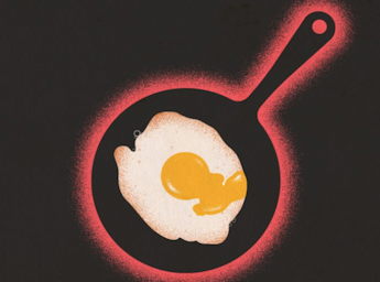 A picture of a fried egg in a black frying pan surrounded by a red glow.