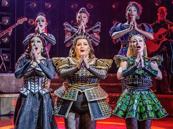 A picture of six women singing.