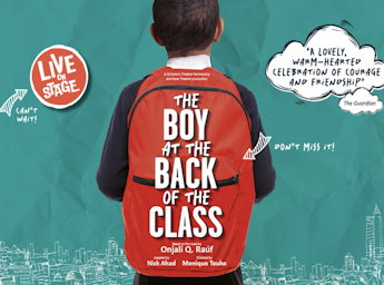 A picture of the back of a boy and his red backpack.