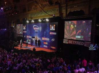Dart competition in the Empress Ballroom full of spectators.
