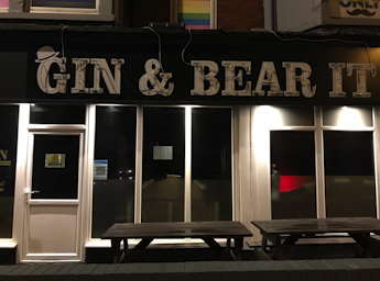 Front of Gin & Bear at night