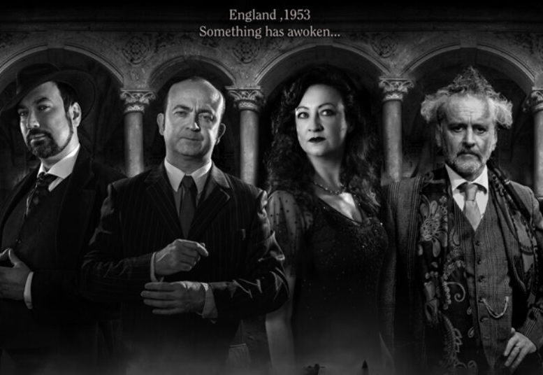A black and white picture of the main characters.
