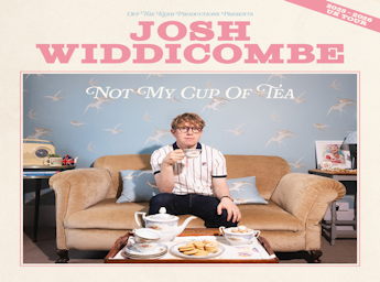 A picture of Josh Widdicombe having tea eated on a sofa.