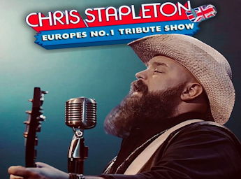 A picture of Chris  Stapleton singing.